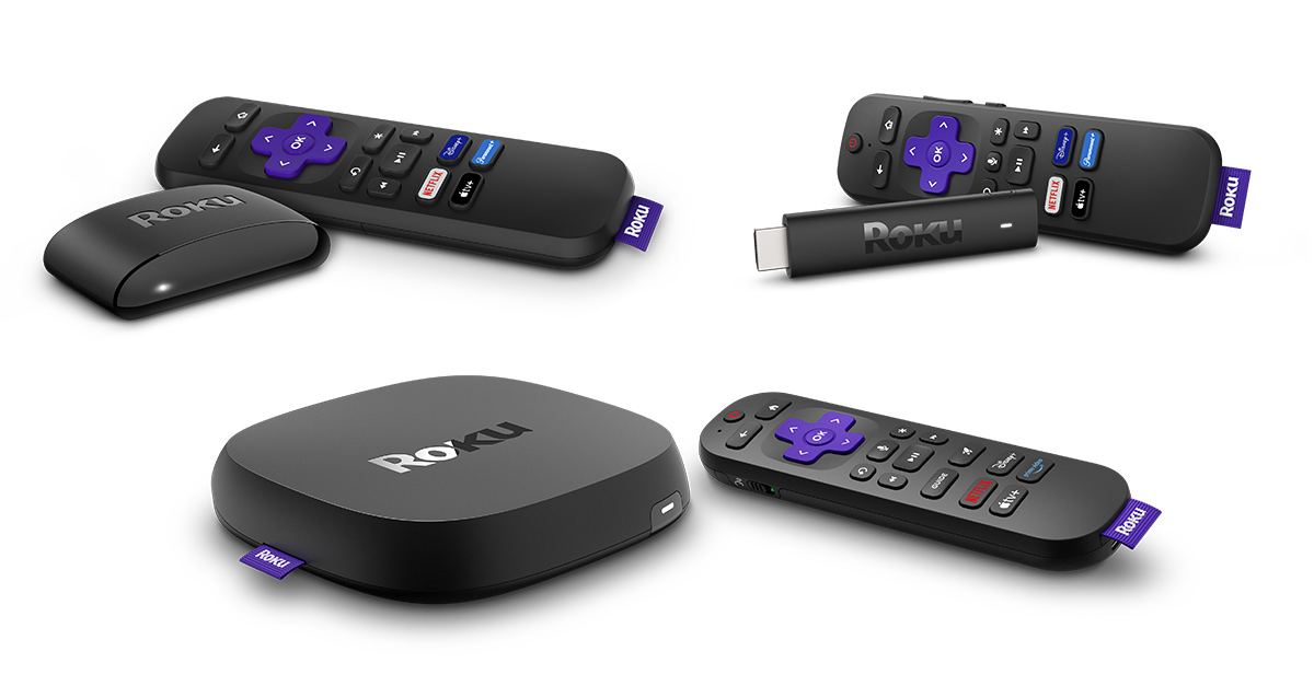 Various Roku streaming devices and their remotes displayed on a white background, including a Roku streaming stick, a small Roku box, and a larger Roku player, each paired with a black remote featuring purple directional buttons and dedicated streaming service keys.